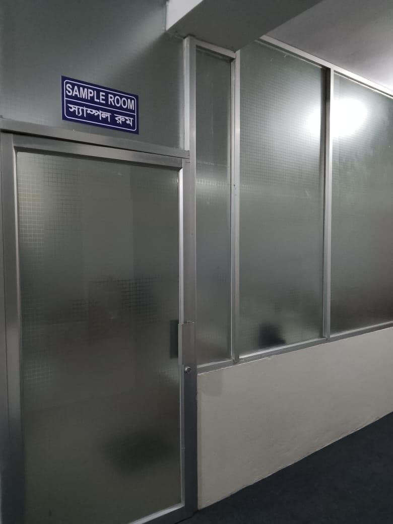 Sample room entrance with signage
